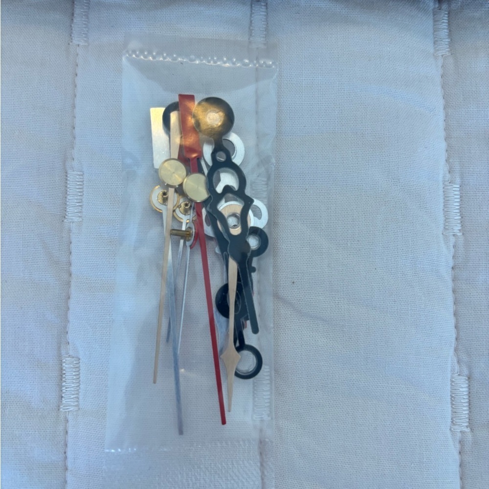 Assorted Watch Hands Set in Gold, Silver, and Black